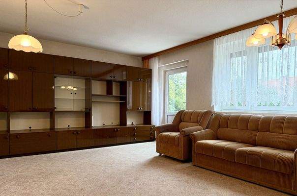 Wohnzimmer mit Zugang zur Terrasse