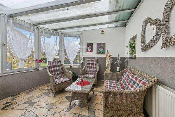 Wintergarten mit Gartenzugang