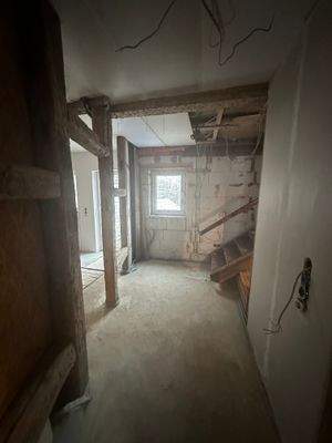 Flur mit Treppenaufgang zum Obergeschoss