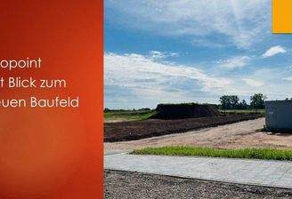 Infopoint mit Blick zum neuen Baufeld.jpg