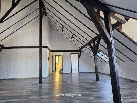 Wohnzimmer Blick Richtung Küche und Diele