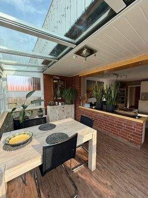 Wohnzimmer/ Wintergarten 