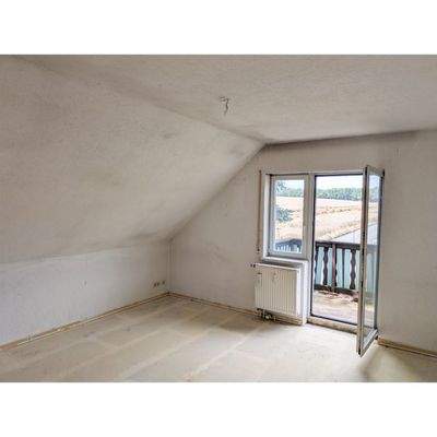 Wohnzimmer mit Bakontür