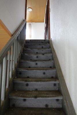 Treppe ins Obergeschoss