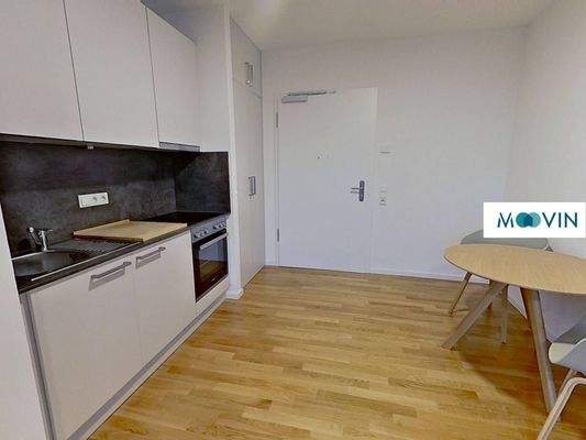 Ansicht II: Wohn- und Schlafzimmer mit offenem Küchenbereich