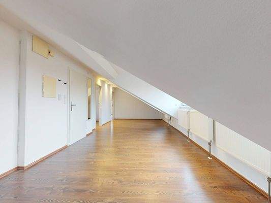 Ansicht VI: Wohn- und Esszimmer mit offenem Küchenbereich