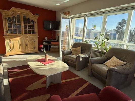 Wohnzimmer mit kleinem Wintergarten OG