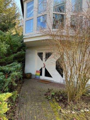 Hauseingang mit Wintergarten