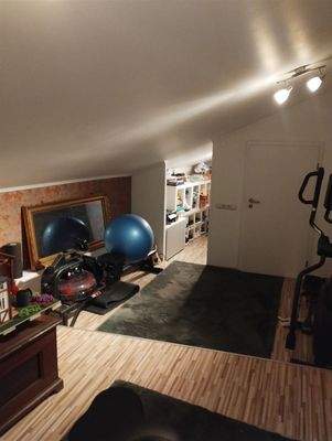 Fitnessstudio und begehbarer Kleiderschrank