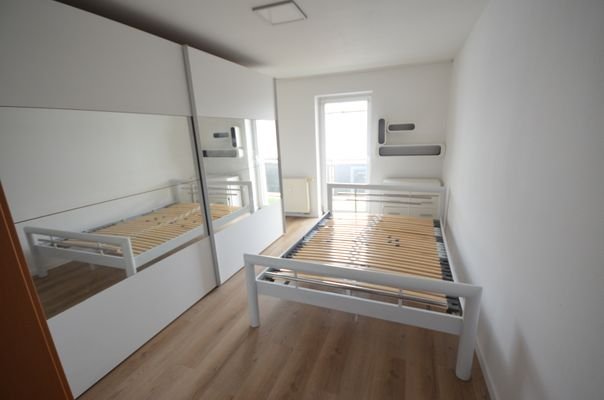 Schlafzimmer mit Balkon