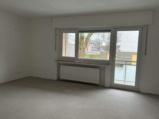 Wohnzimmer mit Balkon