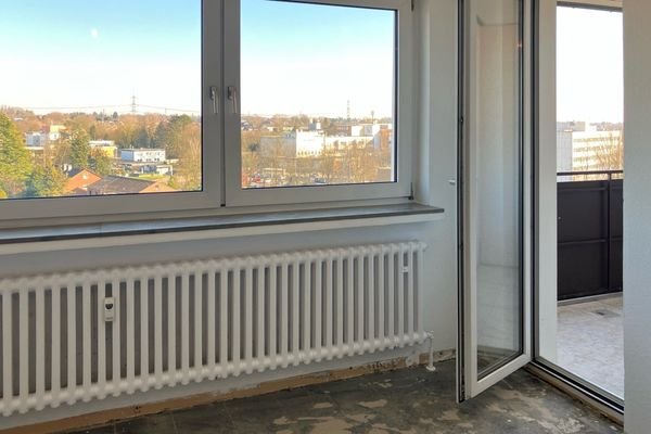 Wohnzimmer mit Zugang zur Loggia