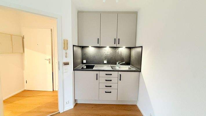 Eingang und Einbauküche