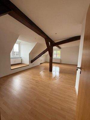 Wohnzimmer einer Wohnung im DG