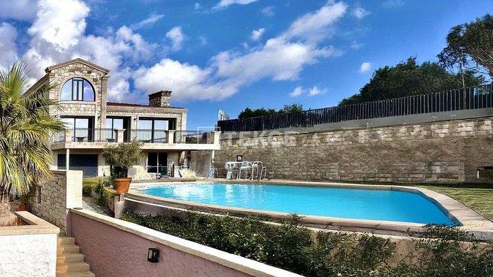 Specially Designed Stone-Coated Home with Pool in Çeşme