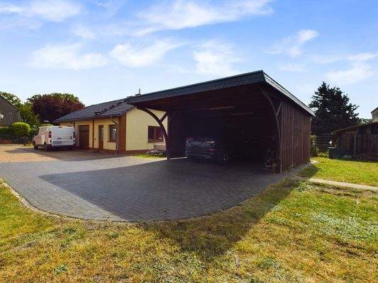 Doppelcarport und Garage mit Werkstatt