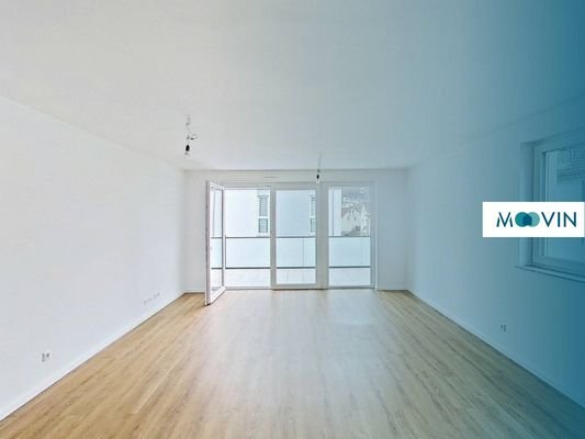Ansicht I: Wohnzimmer mit offenem Küchenbereich