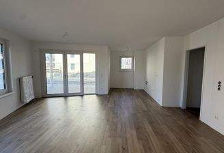 Haus_3_Top_2_Wohnbereich_mit_Blick_auf_die_Küche_