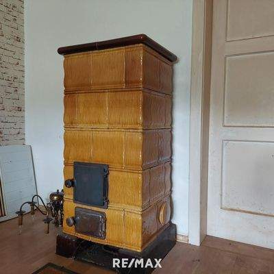 KG Wohnung Kachelofen