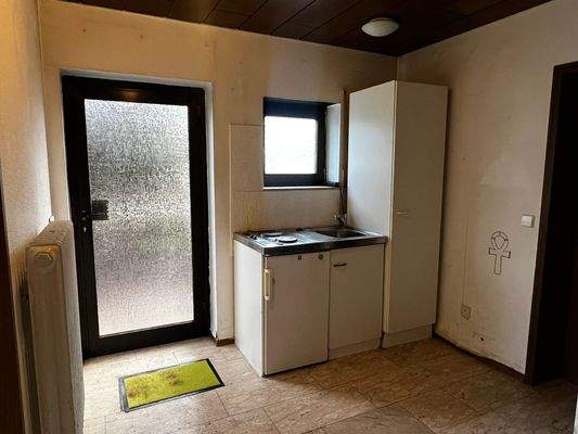 Eingang und Küchenzeile in der EW