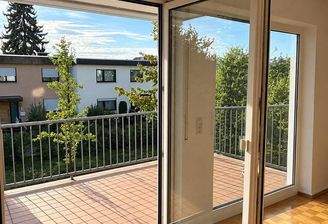 Doppelflügeltüren um Balkon