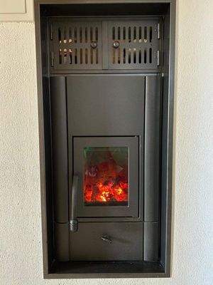 Anfeuerung Kachelofen Gang