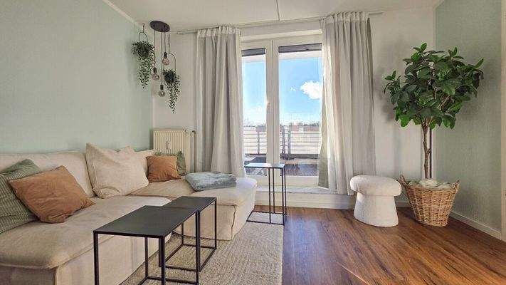 Wohnbereich mit Ausgang zur Sonnenterrasse