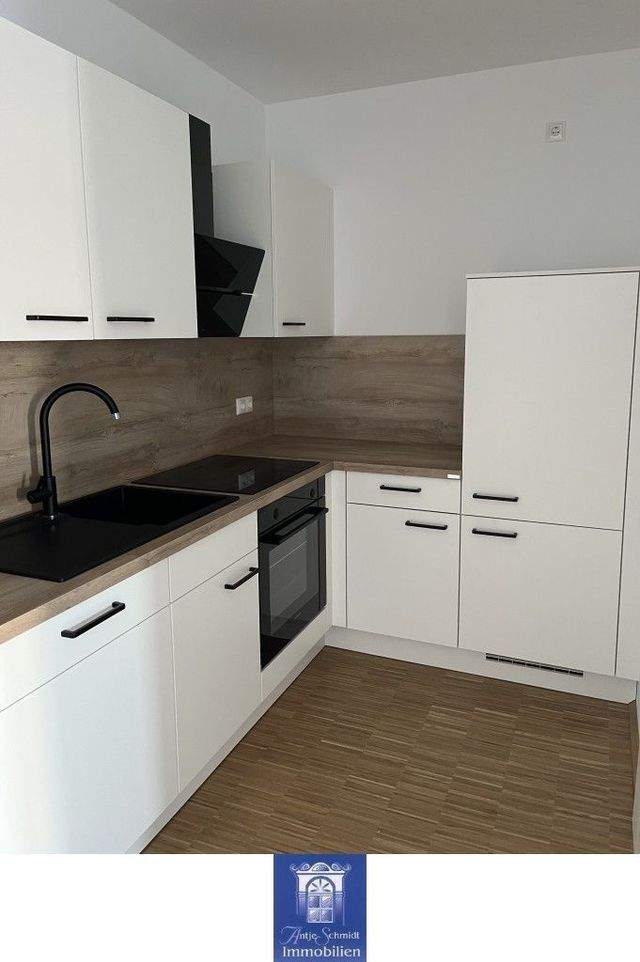 Charmant wohnen im Erstbezug ... moderne Ausstattung ... Fußbodenheizung ... Terrasse! - Foto 1
