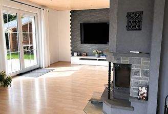 Wohnzimmer mit Kaminofen