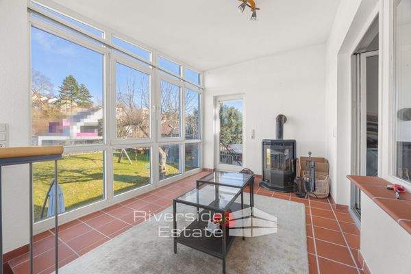 Wintergarten mit Kamin