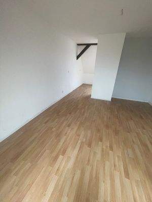 Wohnzimmer mit Holzboden