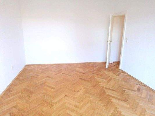 Schlafzimmer mit Parkett