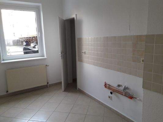 Küche mit angrenzendem Abstellraum