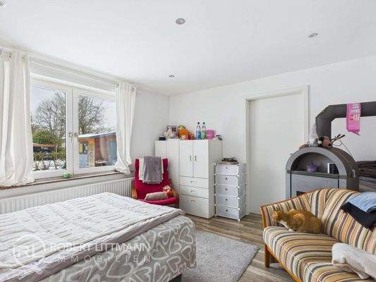 Wohnzimmer Einliegerwohnung mit Kamin