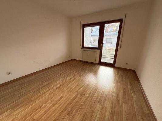 Schlafzimmer mit Balkon