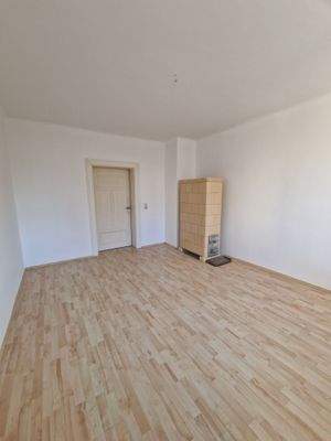 Wohnzimmer mit Kachelofen