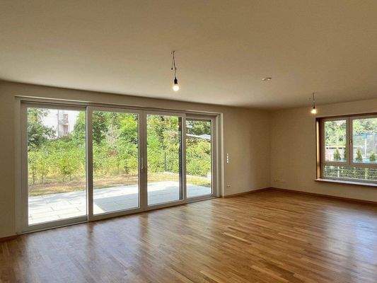 Wohnraum mit offener Küche - Bild 1