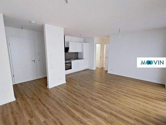 Ansicht II: Wohnzimmer mit offener Küche