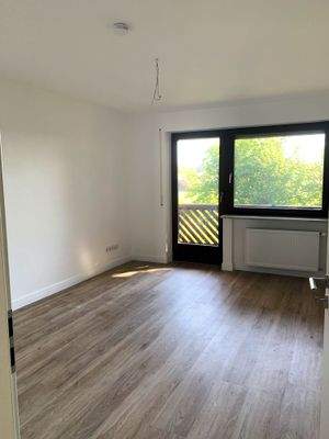 Schlafzimmer mit Balkonzugang