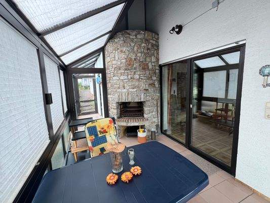 Haus 1 Wintergarten mit Kamin EG