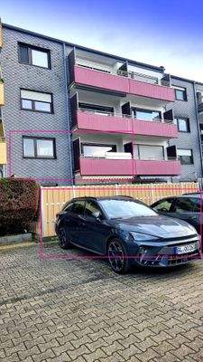 Rückansicht Balkon & Stellplatz.jpg