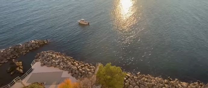 Sonnenuntergang mit Boot und Meer (Blick ex SZ)