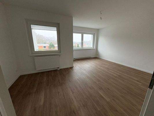 Wohnzimmer mit Balkon