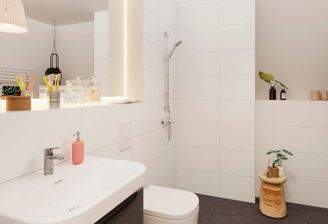 Badezimmer mit bodengleicher Dusche
