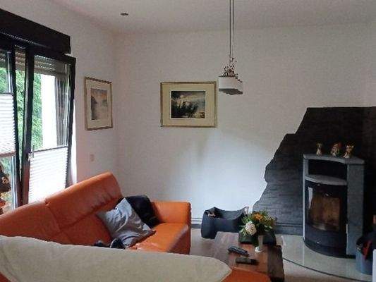 Wohnzimmer mit Kaminofen EG