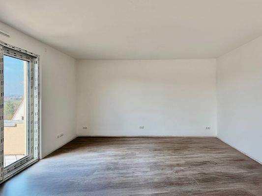 Wohnbereich mit Zugang zur Dachterrasse - Bautenstand KW 13