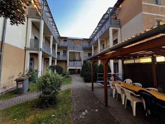 Innenhof mit Sitzecke Hausgemeinschaft