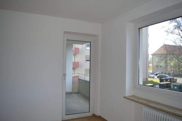 Zimmer mit Balkonzugang