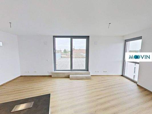 Ansicht II: Wohn- und Esszimmer mit offenem Küchenbereich