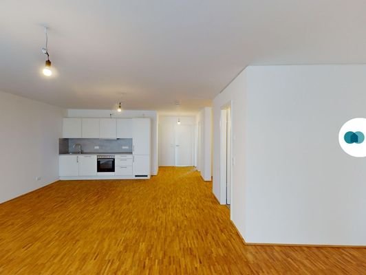 Ansicht III: Wohn- und Esszimmer mit offenem Küchenbereich
